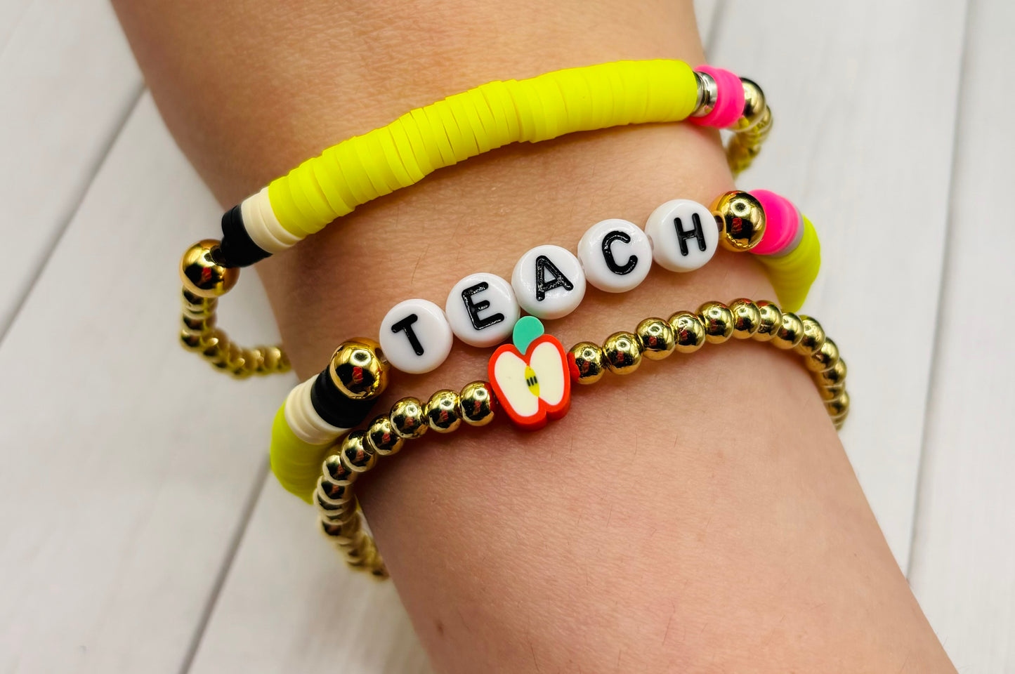 "Teach" Bracelet stack